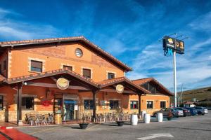 a building with a traffic light in front of it at Reinosa Atalaya-La Vega in Reinosa