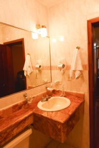 Koupelna v ubytování Hotel Makroz