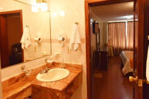 Koupelna v ubytování Hotel Makroz