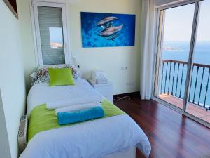 Posteľ alebo postele v izbe v ubytovaní Villa OCEAN Infinity heated pool optional