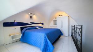 Tempat tidur dalam kamar di Admiring Amalfi