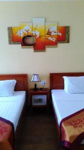Letto o letti in una camera di Tabii hotel
