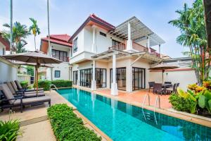 an image of a villa with a swimming pool at Laguna Pool Villas in Bang Tao Beach