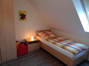Ένα ή περισσότερα κρεβάτια σε δωμάτιο στο 50101 Sonnenwind 1