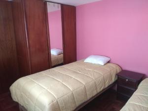 Postelja oz. postelje v sobi nastanitve Cusco`s Flat 2