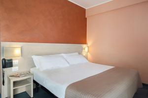 Postel nebo postele na pokoji v ubytování Hotel Testani Colleferro