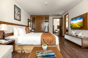 Postelja oz. postelje v sobi nastanitve Tamarind Danang Beach Hotel