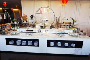 a counter in a store with food on it at Swiss-Belhotel Airport Jakarta in Tangerang