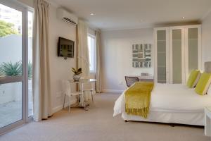 Een bed of bedden in een kamer bij Oxford House