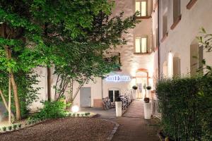 a building with a walkway in front of a building at ArtHotel City in Nuremberg