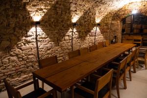 Reštaurácia alebo iné gastronomické zariadenie v ubytovaní Hotel Purkmistr