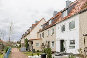 a row of houses in a residential neighborhood at Private House in Hannover