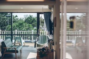Balkón nebo terasa v ubytování Yellow's Kenting B&B