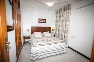 Postel nebo postele na pokoji v ubytování Hostal Venta Del Sol