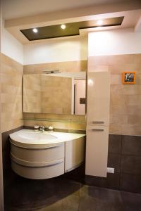 Ein Badezimmer in der Unterkunft Guasto Apartment