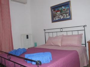 Postel nebo postele na pokoji v ubytování Casa Piacquadio