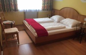 Posteľ alebo postele v izbe v ubytovaní Hotel Pension Alte Mühle