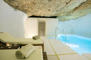 Bazén v ubytování Faustino Gran Relais & Chateaux nebo v jeho okolí