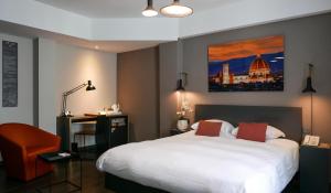 Postel nebo postele na pokoji v ubytování Atlas Hotel Brussels