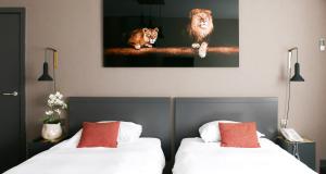 Postel nebo postele na pokoji v ubytování Atlas Hotel Brussels