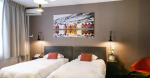 Postel nebo postele na pokoji v ubytování Atlas Hotel Brussels