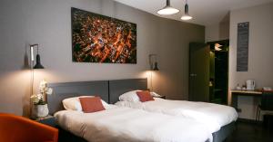Postel nebo postele na pokoji v ubytování Atlas Hotel Brussels