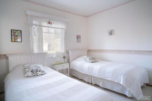 Кровать или кровати в номере Westbay Inn