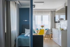 Posteľ alebo postele v izbe v ubytovaní Apartamenty.in Chałupy
