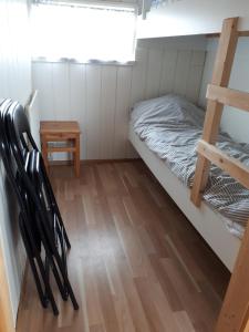 Postel nebo postele na pokoji v ubytování Skjaldvararfoss sumarhús