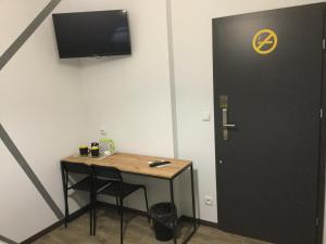 Telewizja i/lub zestaw kina domowego w obiekcie Kimanoclegi