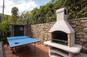 Stolní tenis v ubytování Sunny Garden nebo okolí