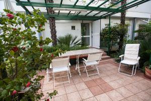 Patio nebo venkovní prostory v ubytování Sunny Garden