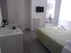 Postel nebo postele na pokoji v ubytování La Casa di Varda