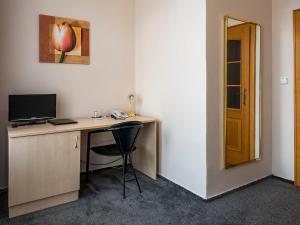Μια τηλεόραση ή/και κέντρο ψυχαγωγίας στο Hotel Olympia Česká Lípa