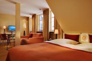 Katil atau katil-katil dalam bilik di Hotel Die Sonne Frankenberg