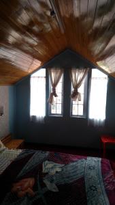 Postel nebo postele na pokoji v ubytování Yashita Homestay
