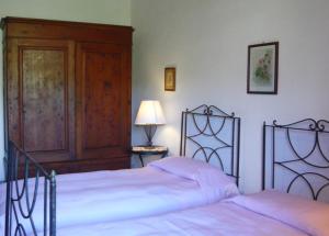 Postel nebo postele na pokoji v ubytování Locanda di Praticino