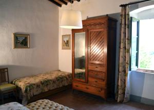 Postel nebo postele na pokoji v ubytování Locanda di Praticino