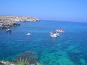 a group of boats in a large body of water at Oasi Di Casablanca in Lampedusa