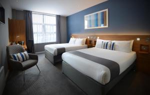 Postel nebo postele na pokoji v ubytování Travelodge Plus Galway