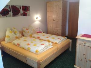 Postel nebo postele na pokoji v ubytování Pension Bräuhaus