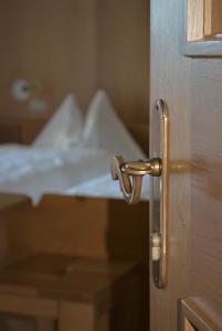 A bed or beds in a room at Residence Scheidnerhof