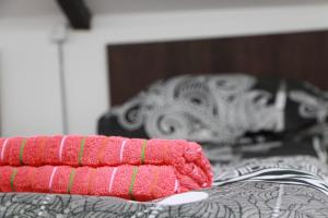 Katil atau katil-katil dalam bilik di Sheni Hostel