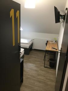 Telewizja i/lub zestaw kina domowego w obiekcie Kimanoclegi