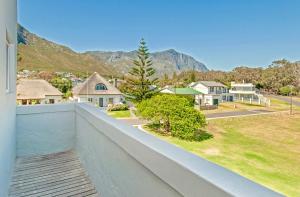 a view from the balcony of a house at Baleens Hotel in Hermanus