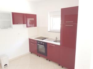Kuchyň nebo kuchyňský kout v ubytování Apartments Margita