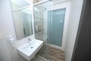 Koupelna v ubytování Hotel Delfin