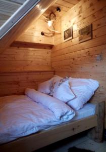 Posteľ alebo postele v izbe v ubytovaní Arcychata Zakopane