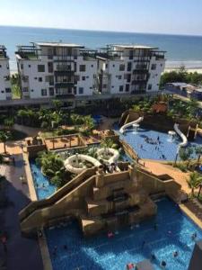 a water park with a water slide in a resort at Seafront Villa at Swiss Garden Resort Residences, Kuantan in Kuantan