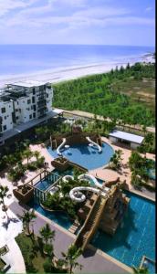 an aerial view of a resort with a water park at Seafront Villa at Swiss Garden Resort Residences, Kuantan in Kuantan